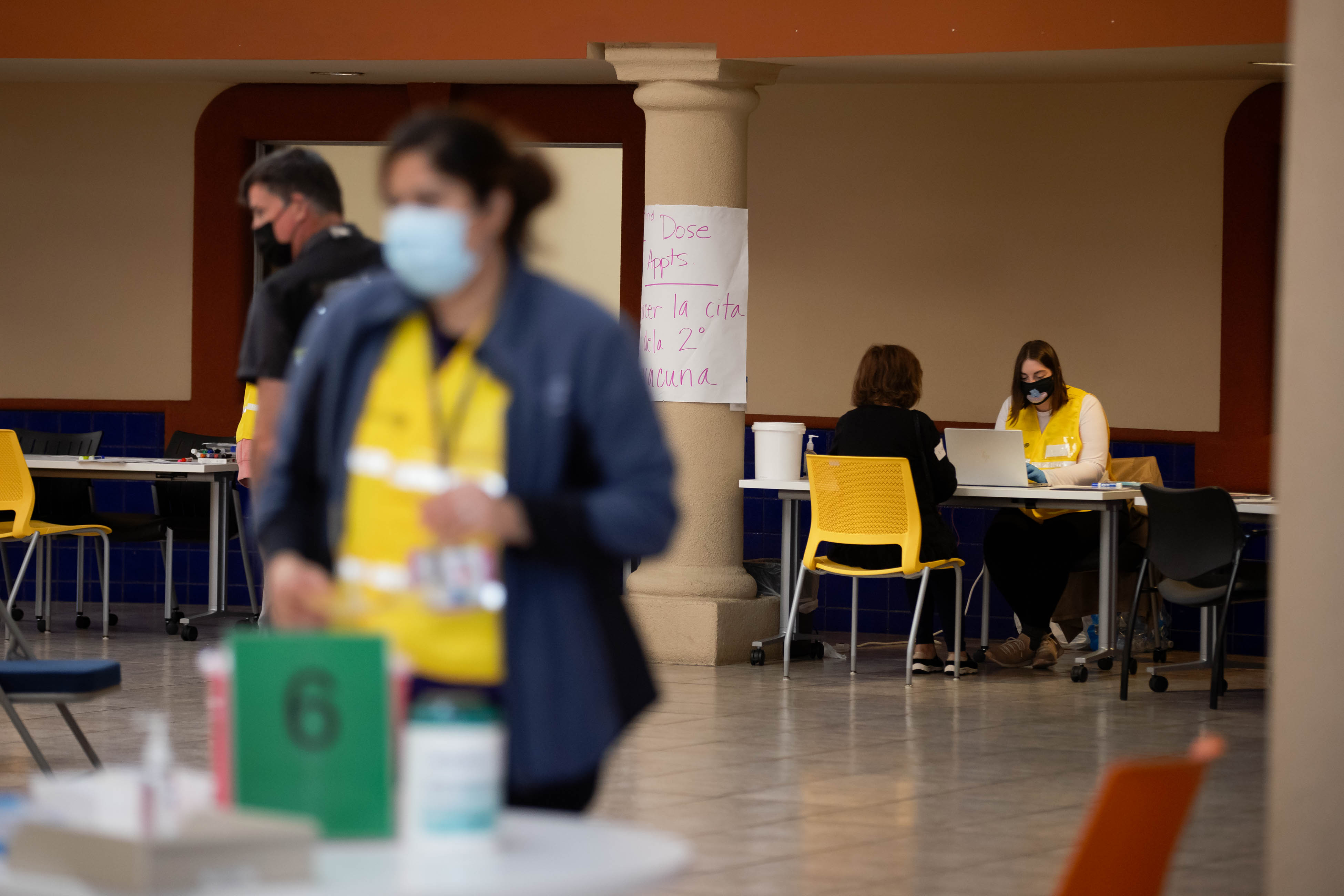 SAN JOSE - FEBRUARY 11: People make appointments at one of Santa Clara County's drop-in vaccination sites in San Jose, Calif., on Thursday, Feb. 11, 2021. (Randy Vazquez/ Bay Area News Group)